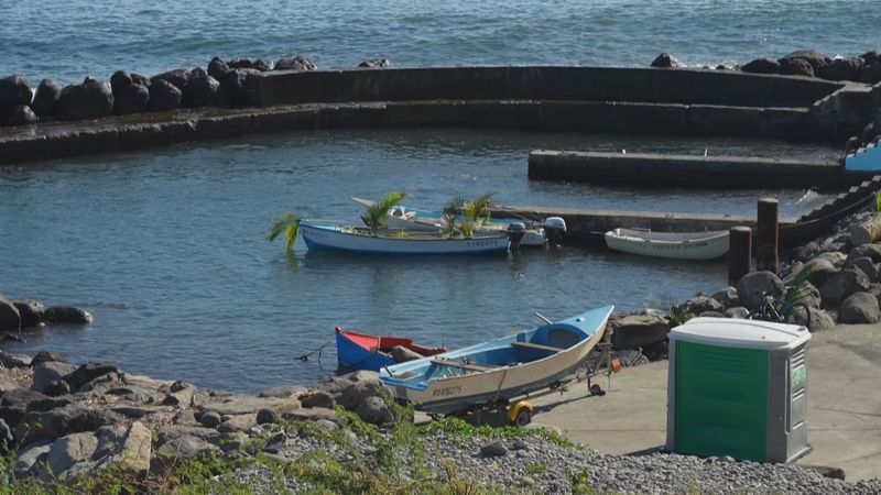 Assomption procession tribute to missing fishermen La Possession