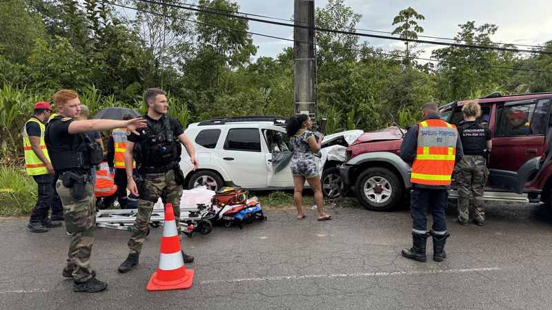 Law enforcement and emergency services secure the accident scene to facilitate interventions